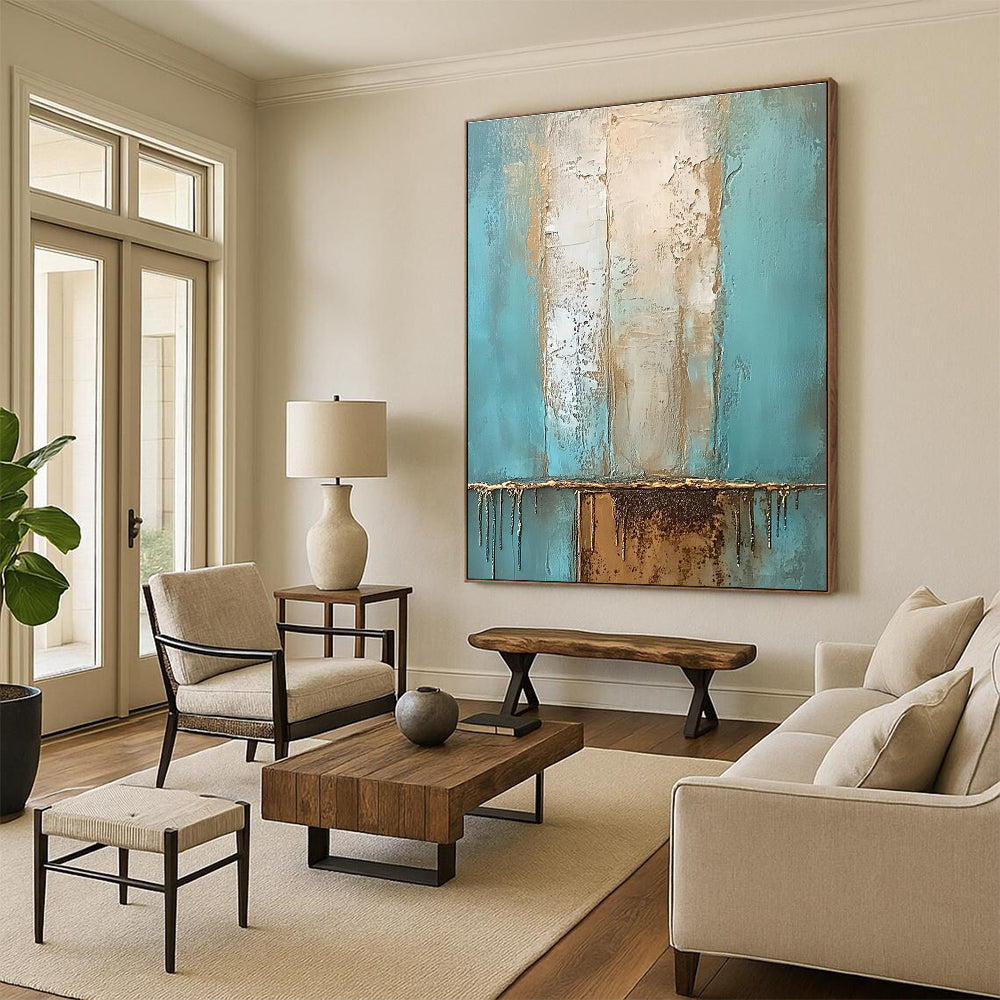 Large abstract oil painting with muted teal and beige hues accented by gold featuring a textured surface and a rusted metal element.STSC602