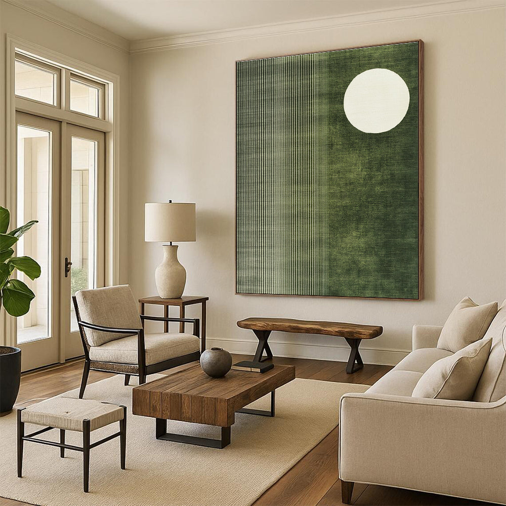 Abstract painting featuring a white circle on olive green fabric-like background with organic patterns and a white half-moon in the corner.STSC1251