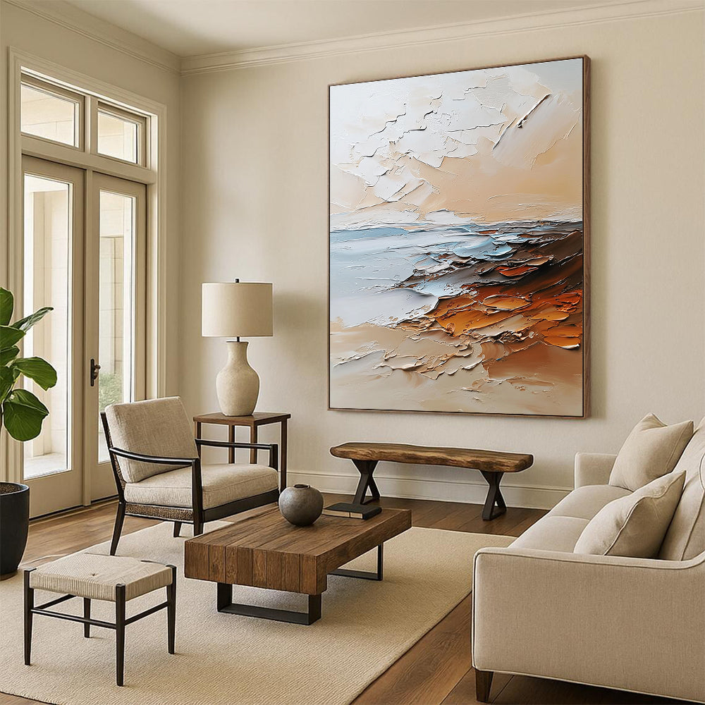 Large abstract painting in beige and white tones featuring textured brushstrokes with light orange brown and gray colors and soft edges.STSC096