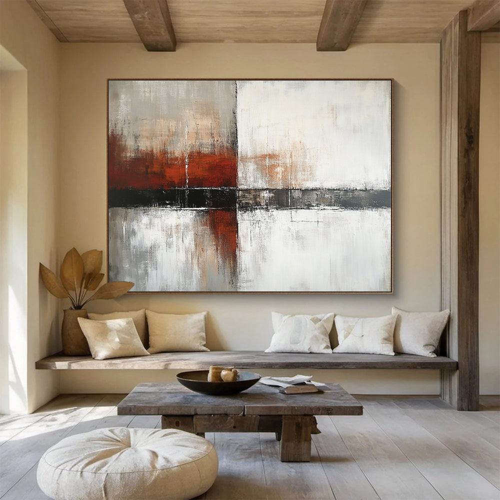 Large abstract painting with a calming color palette of white gray and soft tones featuring dark red orange brushstrokes and textured layers.SC592