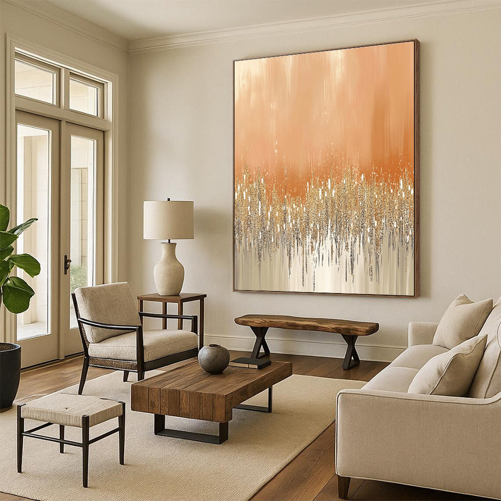Large abstract painting featuring glittery gold and silver dust on a peach-fuzz beige background ideal for festive or glamorous settings.STSC980