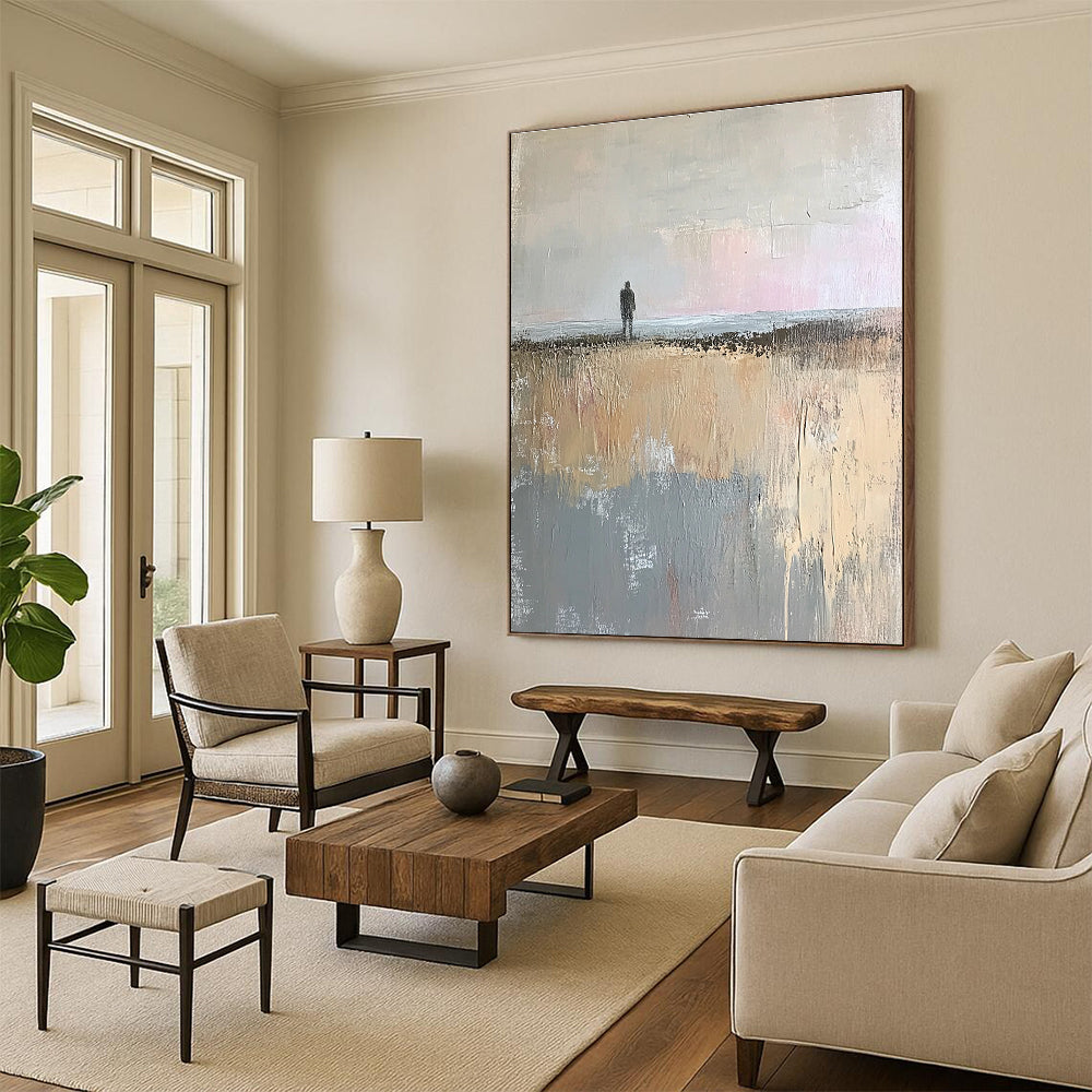 Large abstract painting in muted beige and gray tones showcasing a tranquil open field and distant sea horizon with soft brushstrokes.STSC101