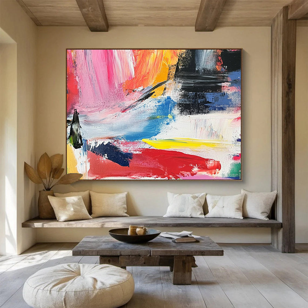 Abstract painting with vibrant colors and bold brush strokes evokes springtime joy and energy in a lively landscape of reds yellows and blues.SC437