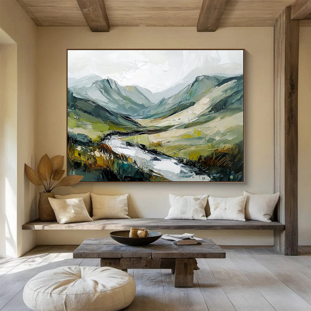 Large abstract painting of an Irish landscape with green and gray mountains flowing river and textured brush strokes against a white sky.SC596
