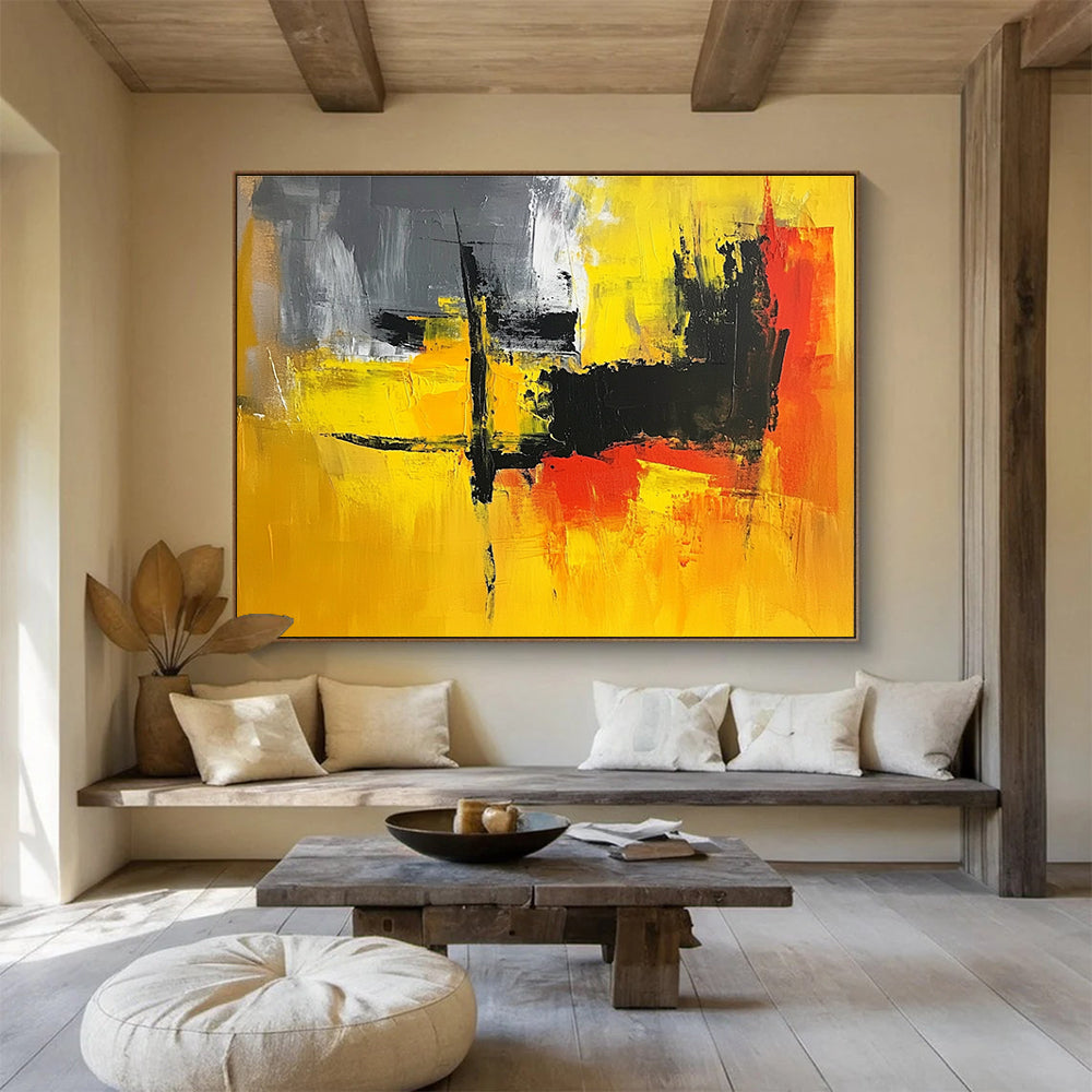 A large abstract painting featuring vibrant yellow, grey, and black hues, perfect for enhancing any contemporary space.SC393