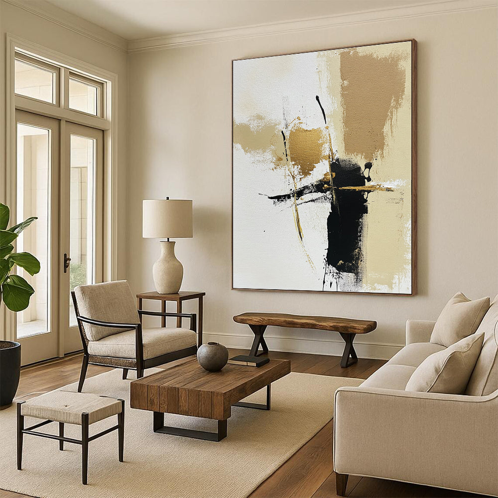 Large abstract painting featuring neutral tones with gold accents on a beige and white background highlighted by brown and black lines and brush strokes.STSC776