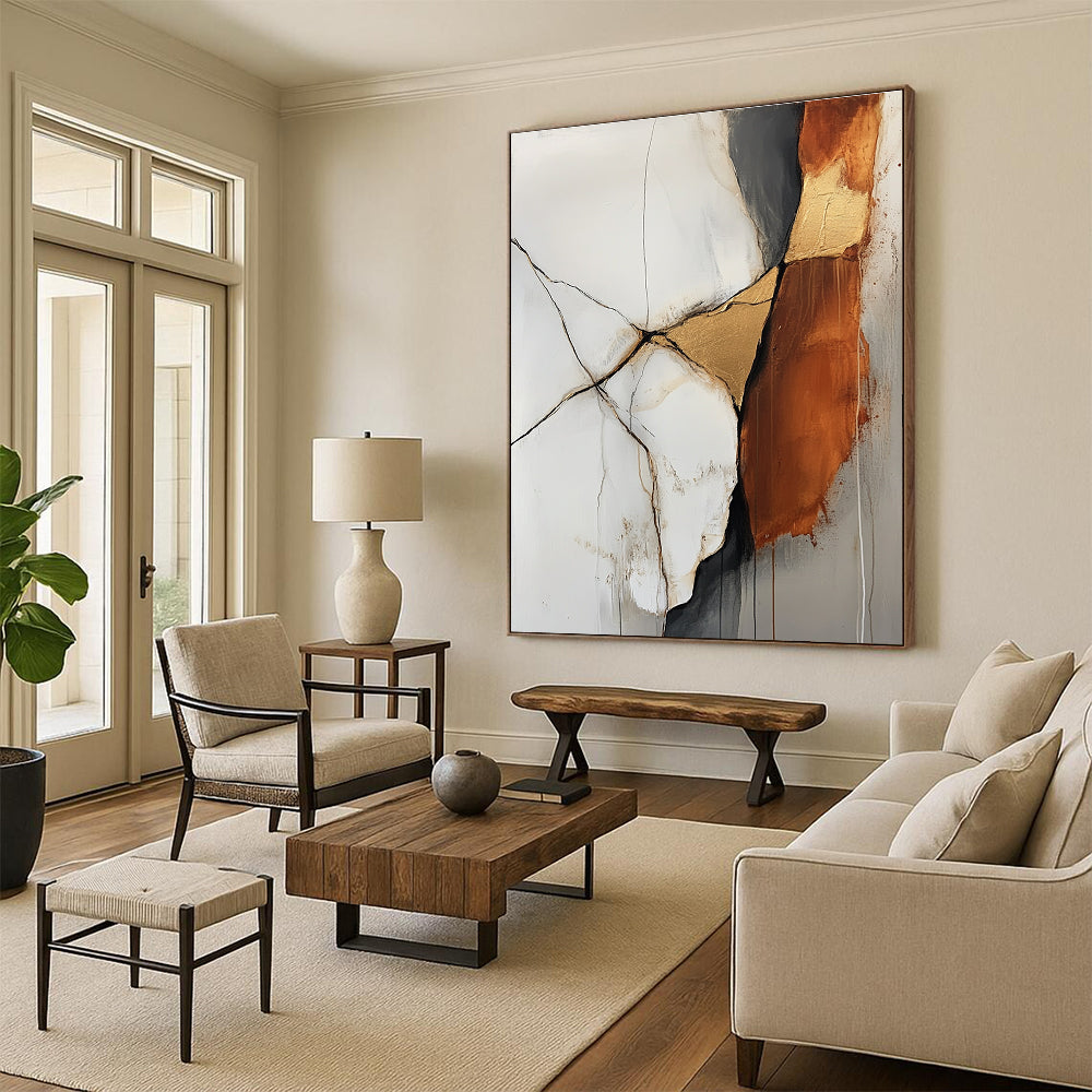 Large abstract painting featuring an off white and rust colored rock with gold veins in a minimalistic style and soft delicate strokes.STSC655