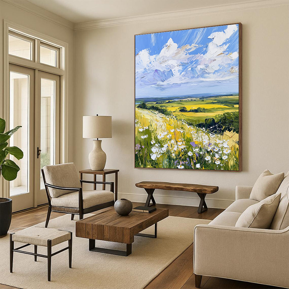 Large abstract painting of the English countryside featuring daisies under a vivid blue sky with fluffy white clouds in a whimsical style.STSC898