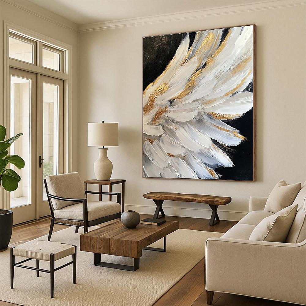 Large abstract painting of white angel wings with gold accents on a black background featuring heavy brush strokes and palette knife work.STSC006