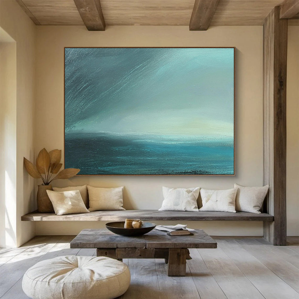 Large abstract painting in impasto technique featuring blue-green sea tones with fog and dark sky using thick, muted layers for atmospheric depth.SC497