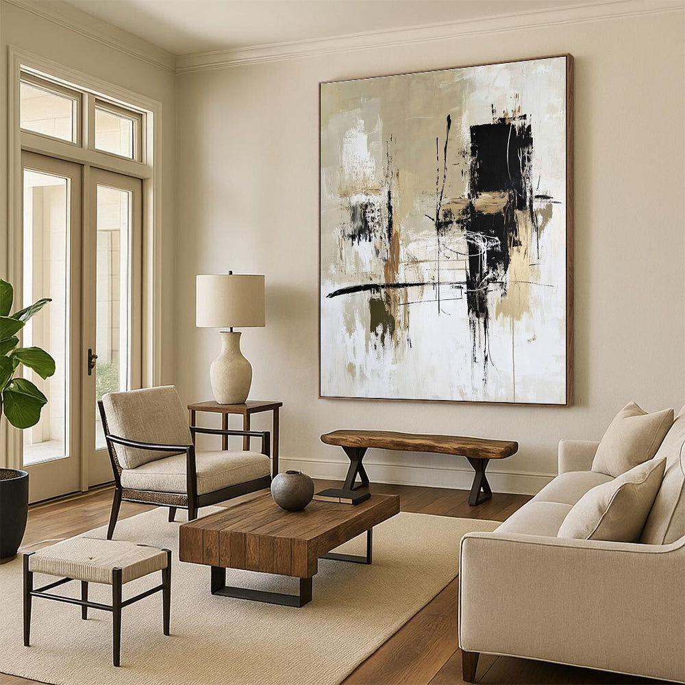 Large abstract painting with bold brushstrokes in high-contrast black white and beige featuring layers of color and dynamic shapes for modern decor.STSC413