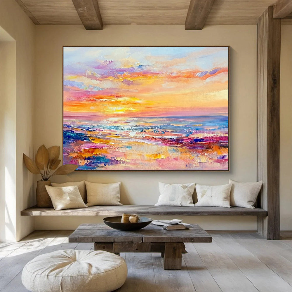 A large abstract painting of the sea at sunset in pastel colors with soft brushstrokes evokes calmness and tranquility.SC416