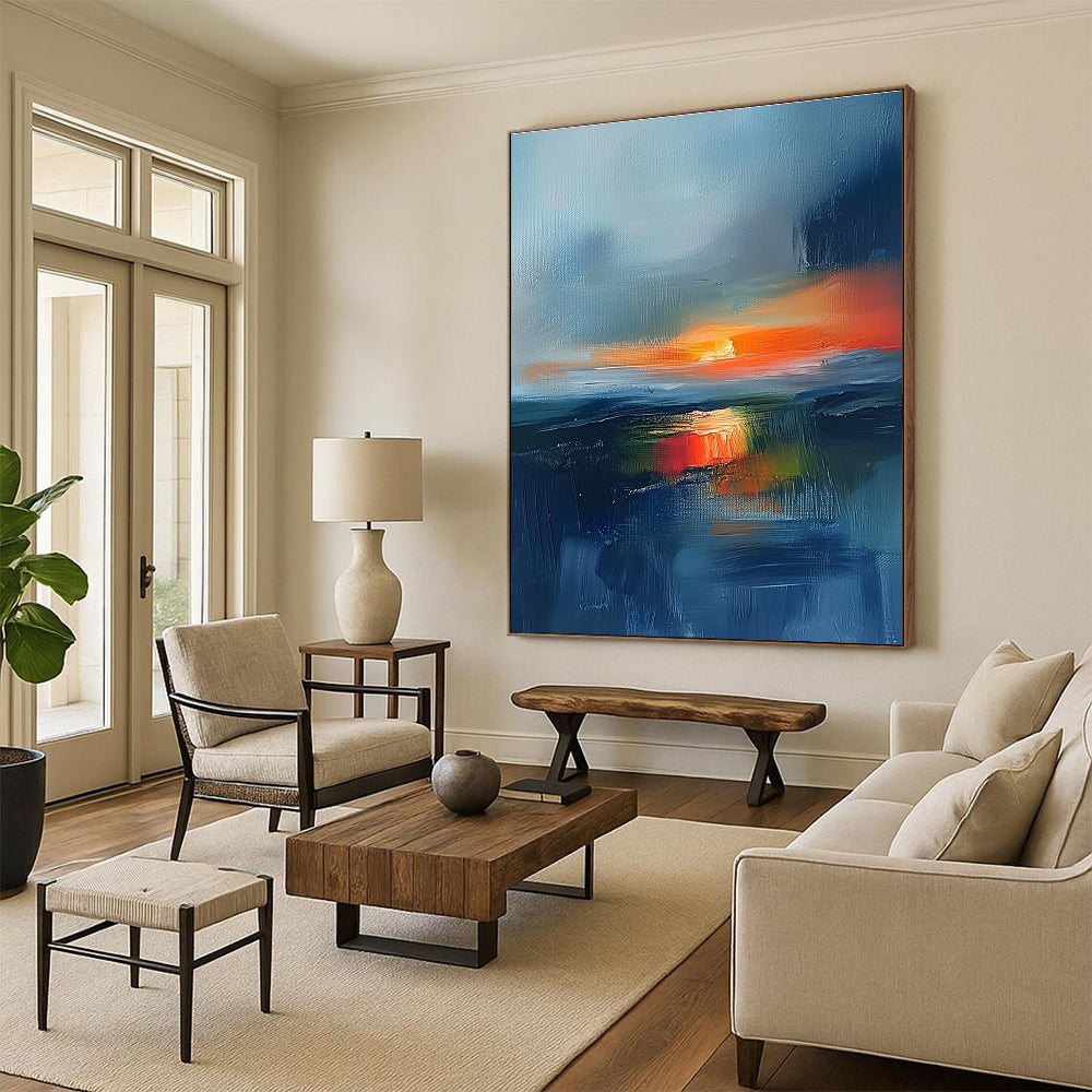 Large abstract painting featuring an Irish landscape at sunset with blue and orange tones and atmospheric clouds for a stunning visual impact.STSC149