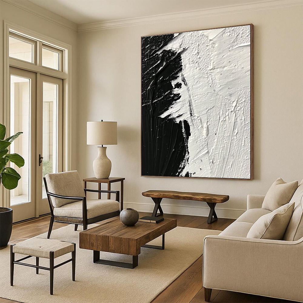 Large abstract painting featuring thick textured brushstrokes in striking black and white tones that evoke profound emotion and creativity.STSC1282