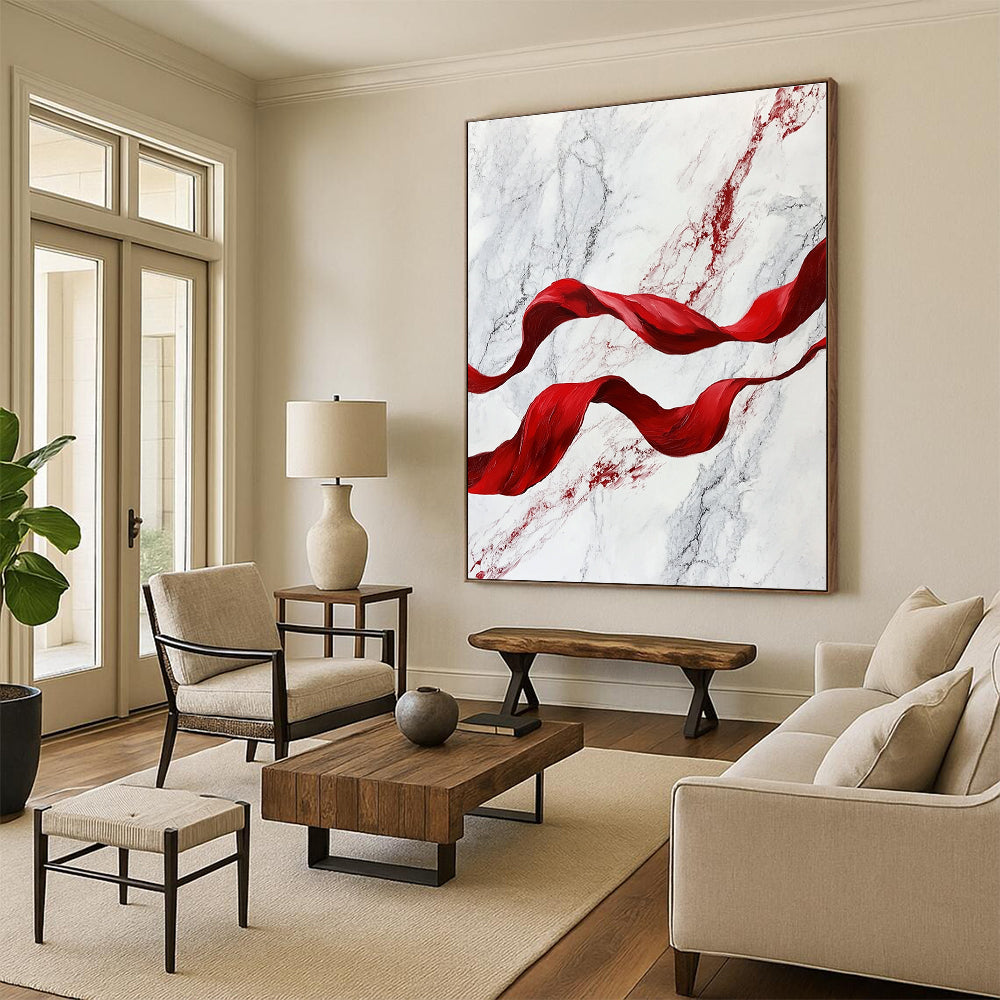 A large abstract painting featuring red flowing ribbons on white marble, evoking movement and elegance in a captivating blend of color and texture.STSC1416