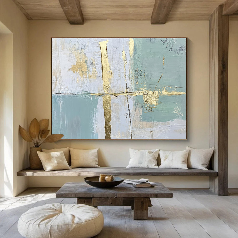 Large abstract painting with pale green and blue lines and shapes enhanced by gold foil accents for an elegant touch.SC326