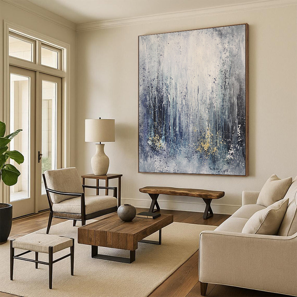 Large abstract painting capturing an ice storm featuring frozen waterfalls and icicles in gray tones with splashes of gold and blue.STSC607