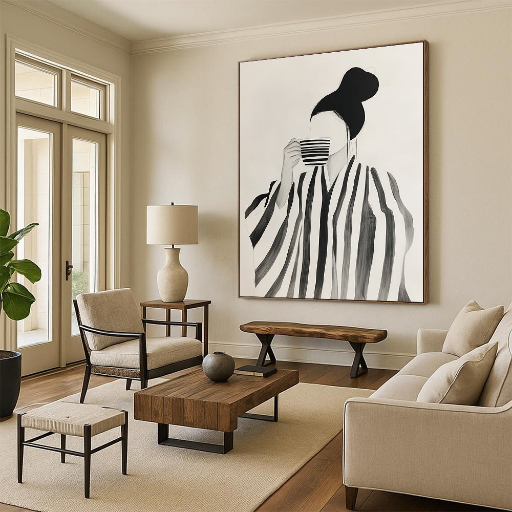 Abstract art featuring a woman in a striped robe enjoying coffee amidst neutral shapes in shades of black and grey on a white background.STSC1344