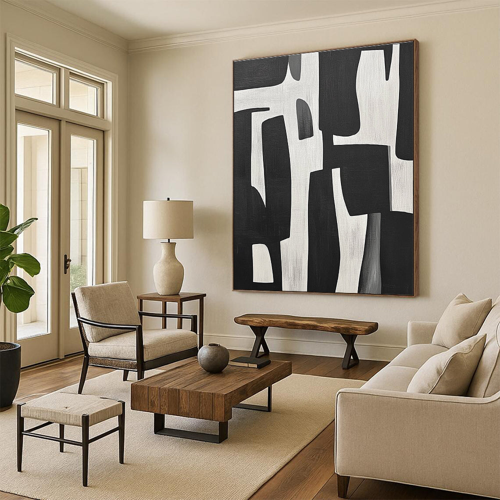 Large abstract painting of black and white shapes inspired by Jean-Paul Gaultier's style showcasing bold contrasts and dynamic forms.STSC328