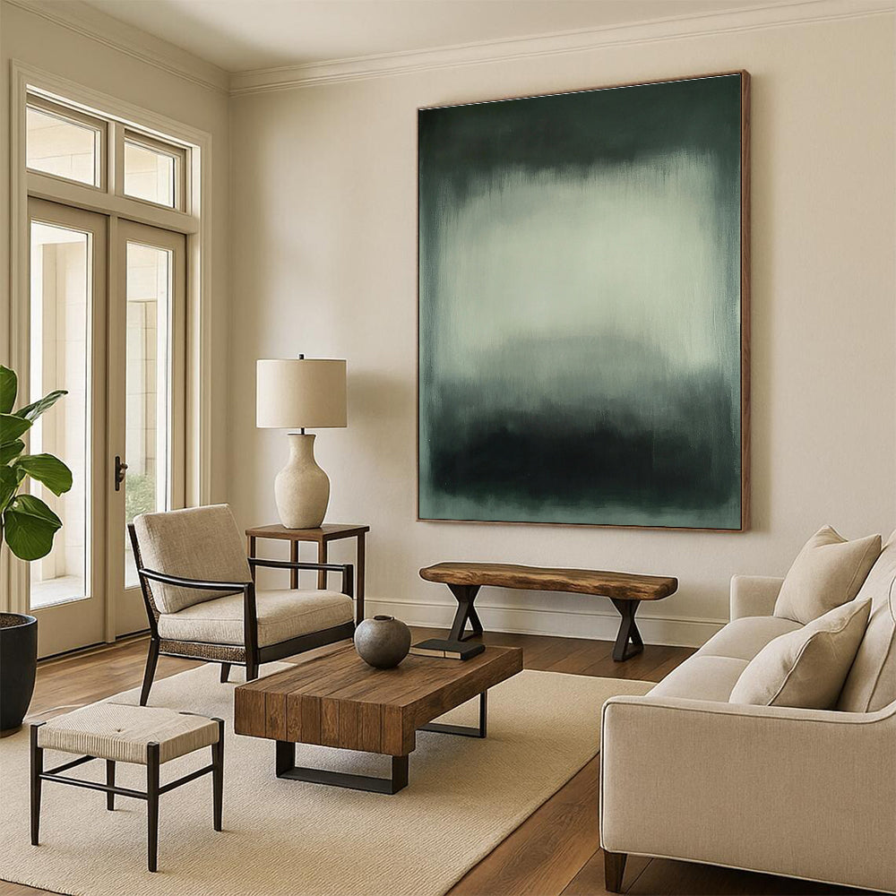 Large abstract painting featuring gray and white hues with blurred edges and a dark green gray background in a soft hazy atmospheric style.STSC683