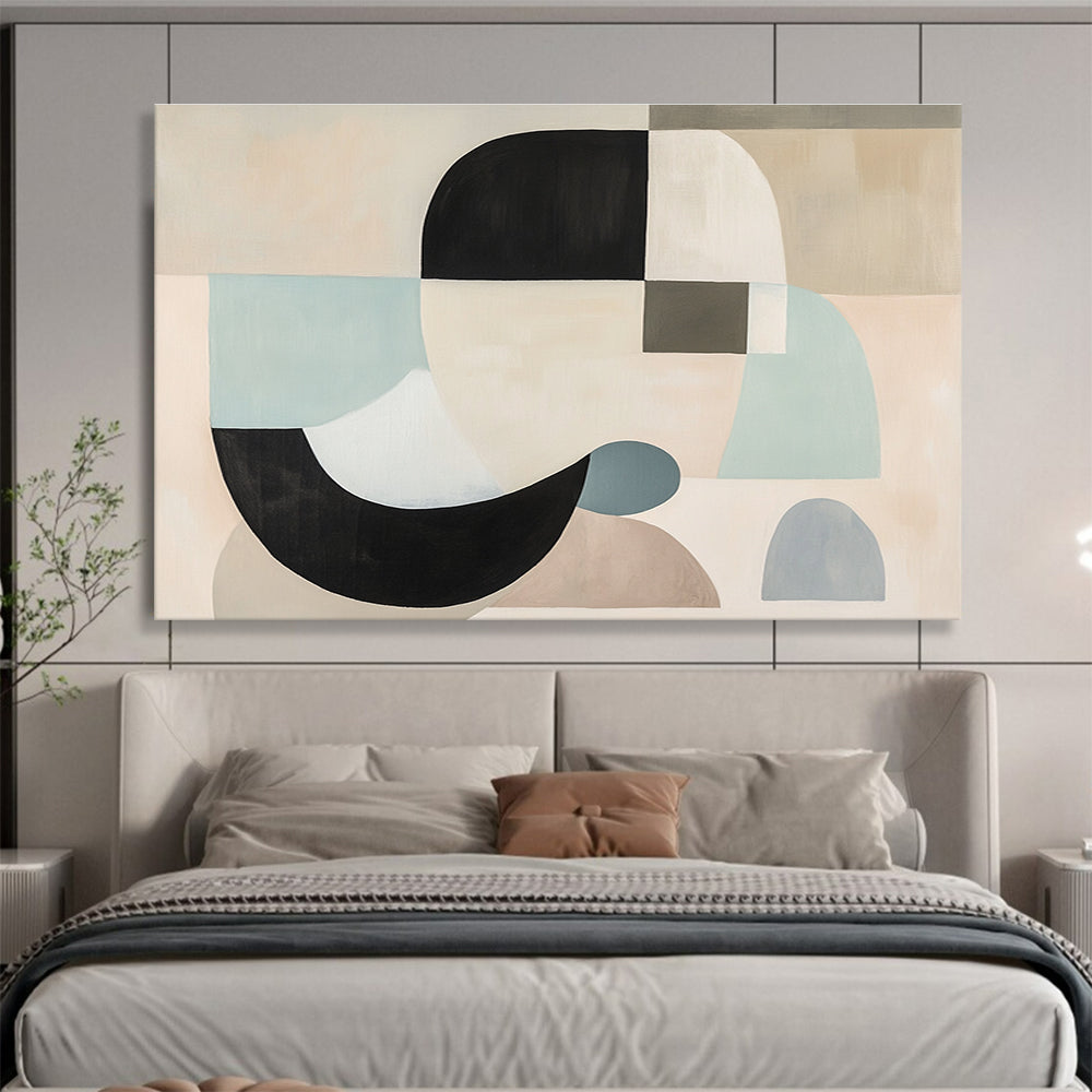 Large abstract painting with white, black, and grey shapes in soft pastel colors featuring geometric forms and a neutral beige background.SC510
