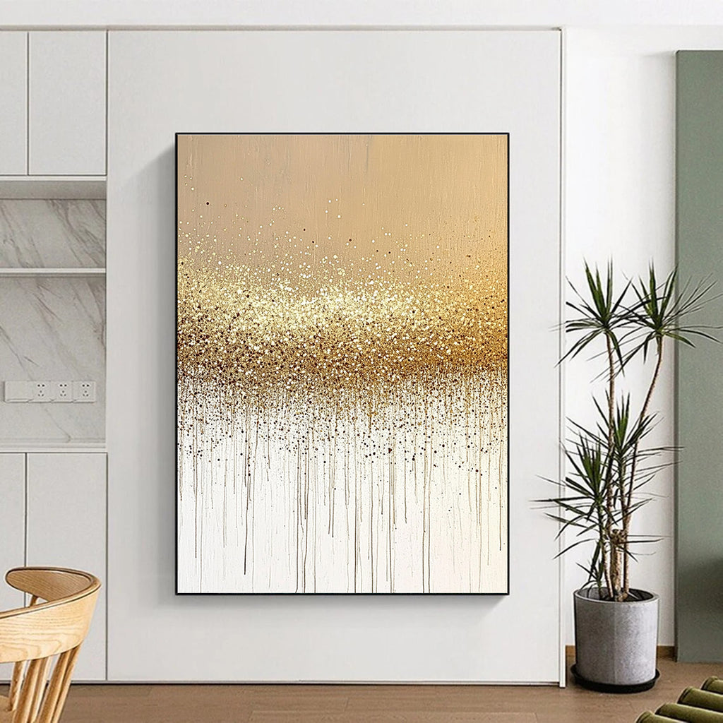 Abstract painting featuring sand and gold glitter on a neutral beige background, showcasing a minimalistic design in soothing tones.STSC994