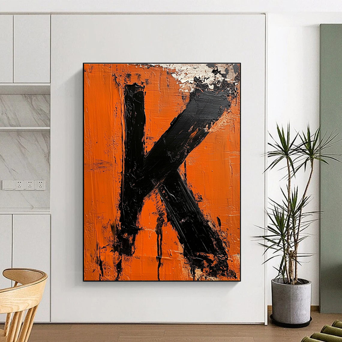 Large abstract impasto oil painting featuring the letter K in vibrant orange and black inspired by minimalist design.STSC1326