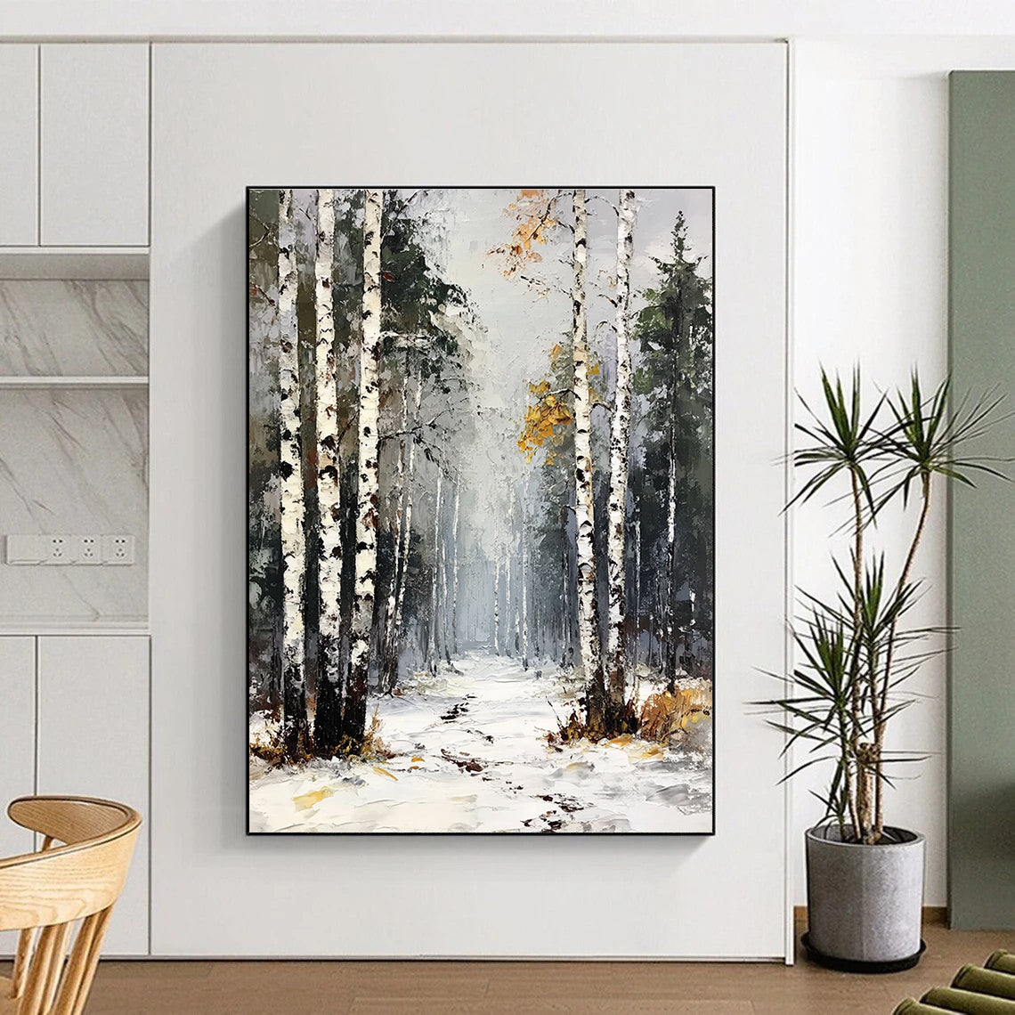 Large abstract painting of a birch forest with white trees green pines and yellow leaves under a gray sky with snow and frost on the ground.STSC1386