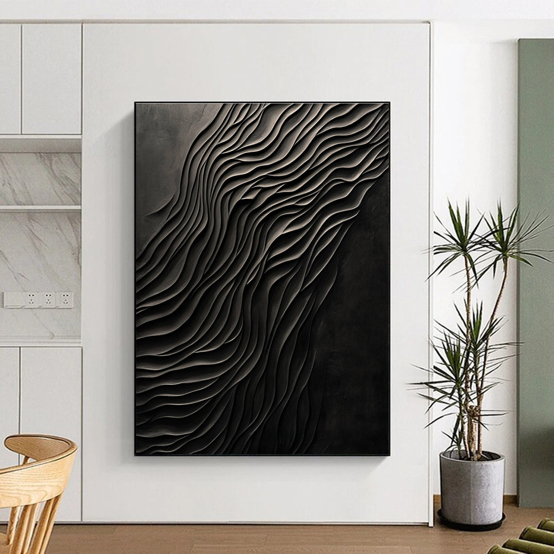 Large abstract art piece featuring dark carved wood with smooth forms and a monochromatic gray palette creating a mysterious atmosphere.STSC1289