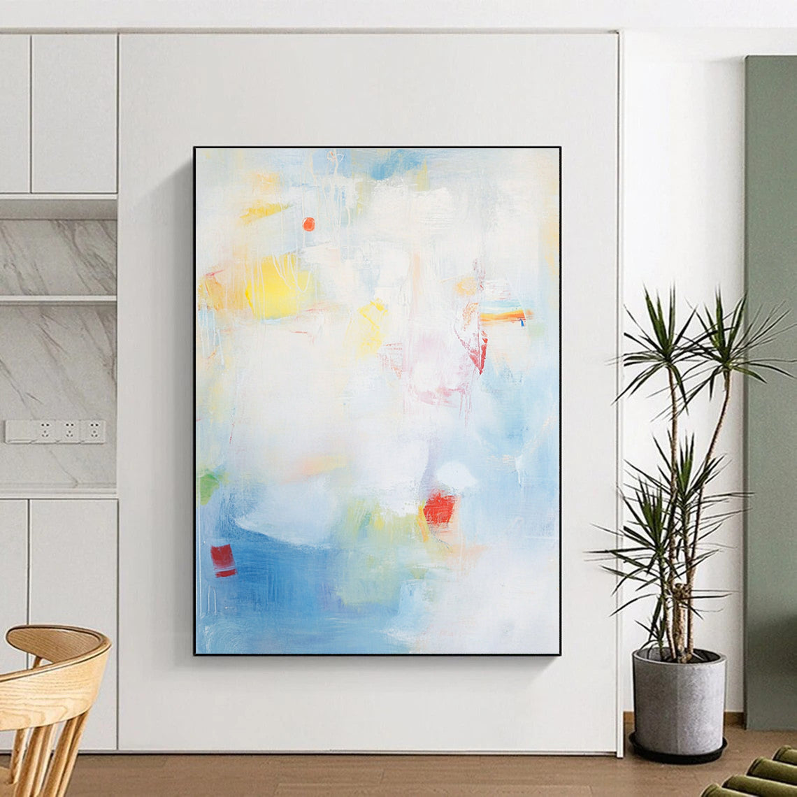 Large abstract painting with a light blue background and soft strokes depicting the sea with waves rocks and fishing boats.STSC401