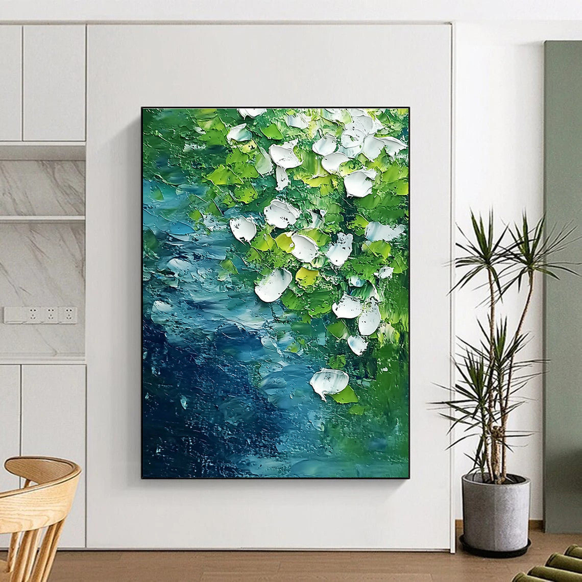 Abstract painting featuring white flowers and flowing water in vibrant green and blue tones capturing the essence of springtime on the riverbank.STSC1477