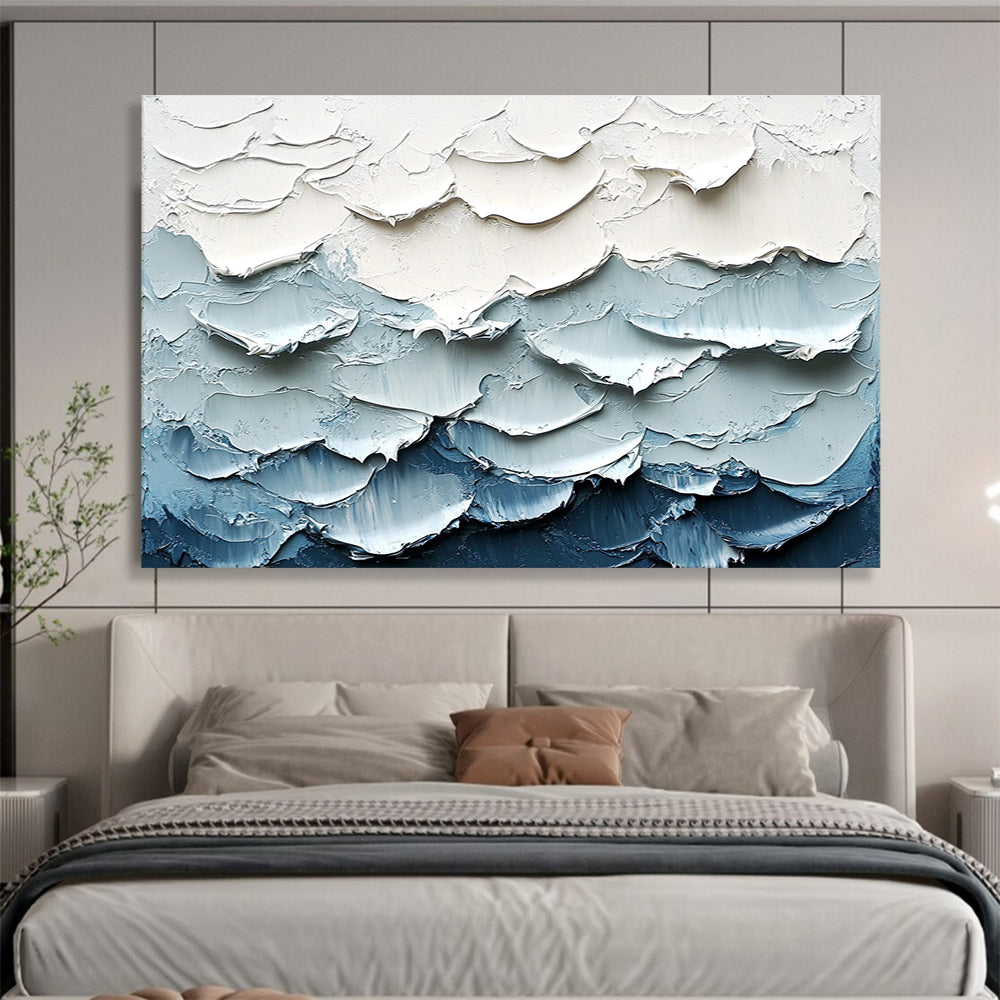 Large abstract painting of waves featuring a white and blue color palette with thick impasto texture for a striking visual effect.SC205