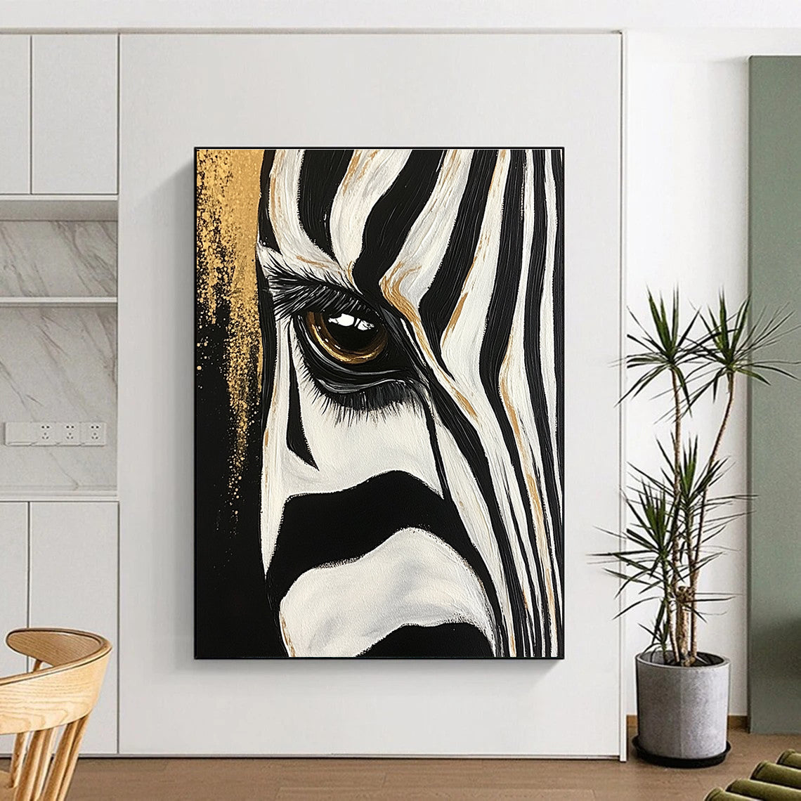 Large abstract painting of a zebra's eye and stripes featuring bold brushstrokes with gold accents against a textured black and white background.STSC956
