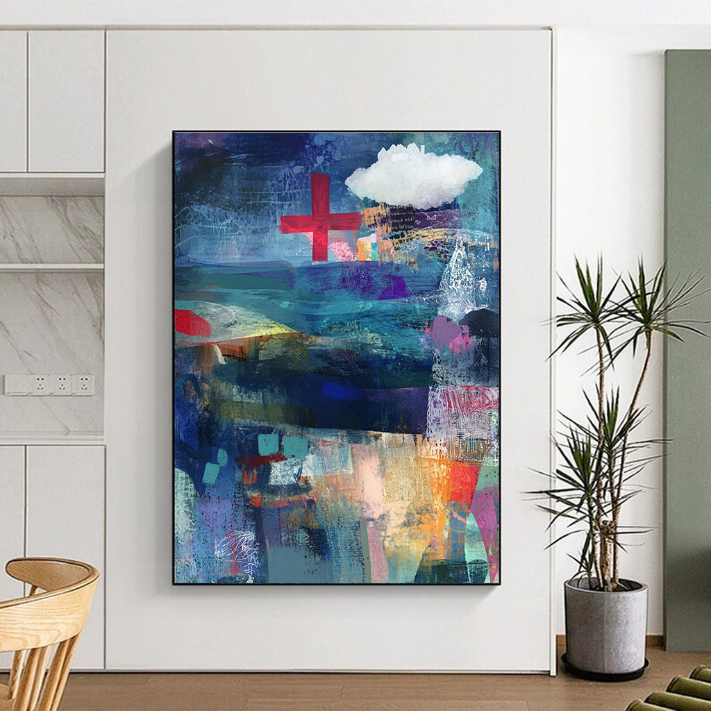 Abstract mixed media collage of the sea in blue and purple with a red cross and white cloud layered with fabric ribbons and watercolor splashes.STSC575