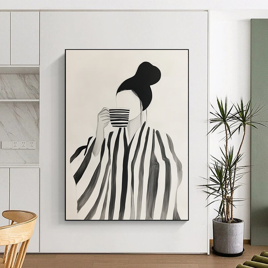 Abstract art featuring a woman in a striped robe enjoying coffee amidst neutral shapes in shades of black and grey on a white background.STSC1344