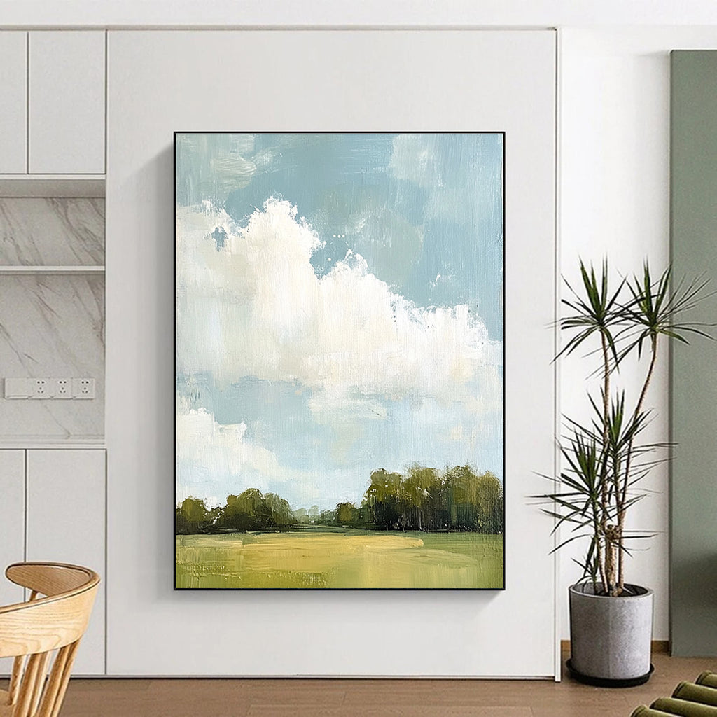 Large abstract painting depicting distant clouds and lush greenery with soft hues and thick brush strokes.STSC874