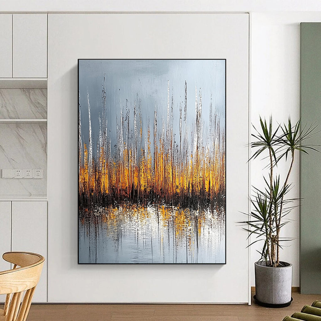 Large abstract painting of silver and gold reeds with reflections on water set against a muted gray background.STSC330