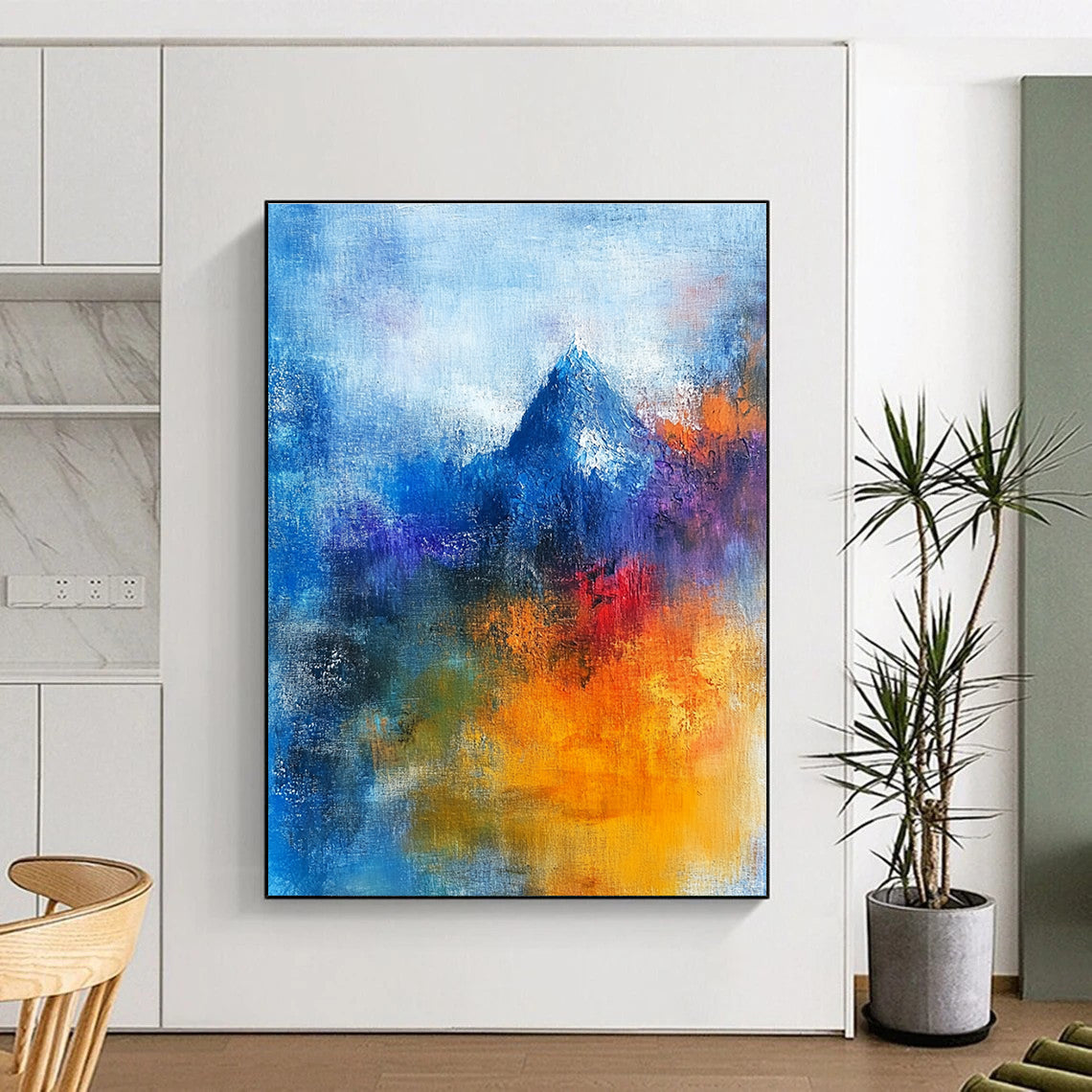 Abstract painting featuring a sacred mountain with vibrant blue and orange hues, human figures in prayer, and a blurred Christ figure, conveying deep spiritual themes.STSC249