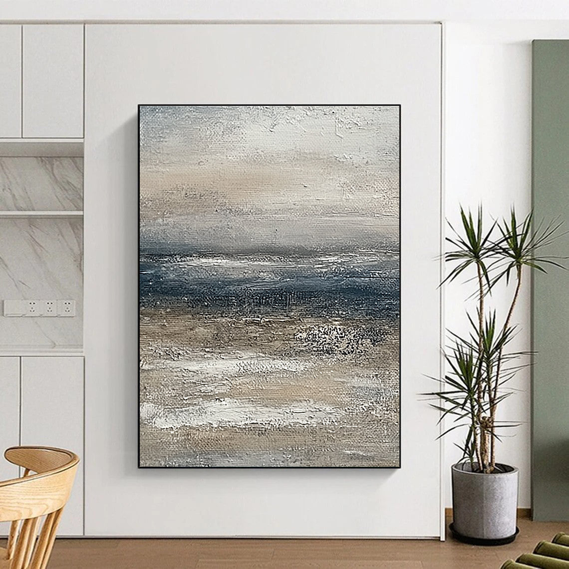 Large abstract painting of the ocean featuring muted beige and grey tones with a soft textured effect on canvas.STSC833