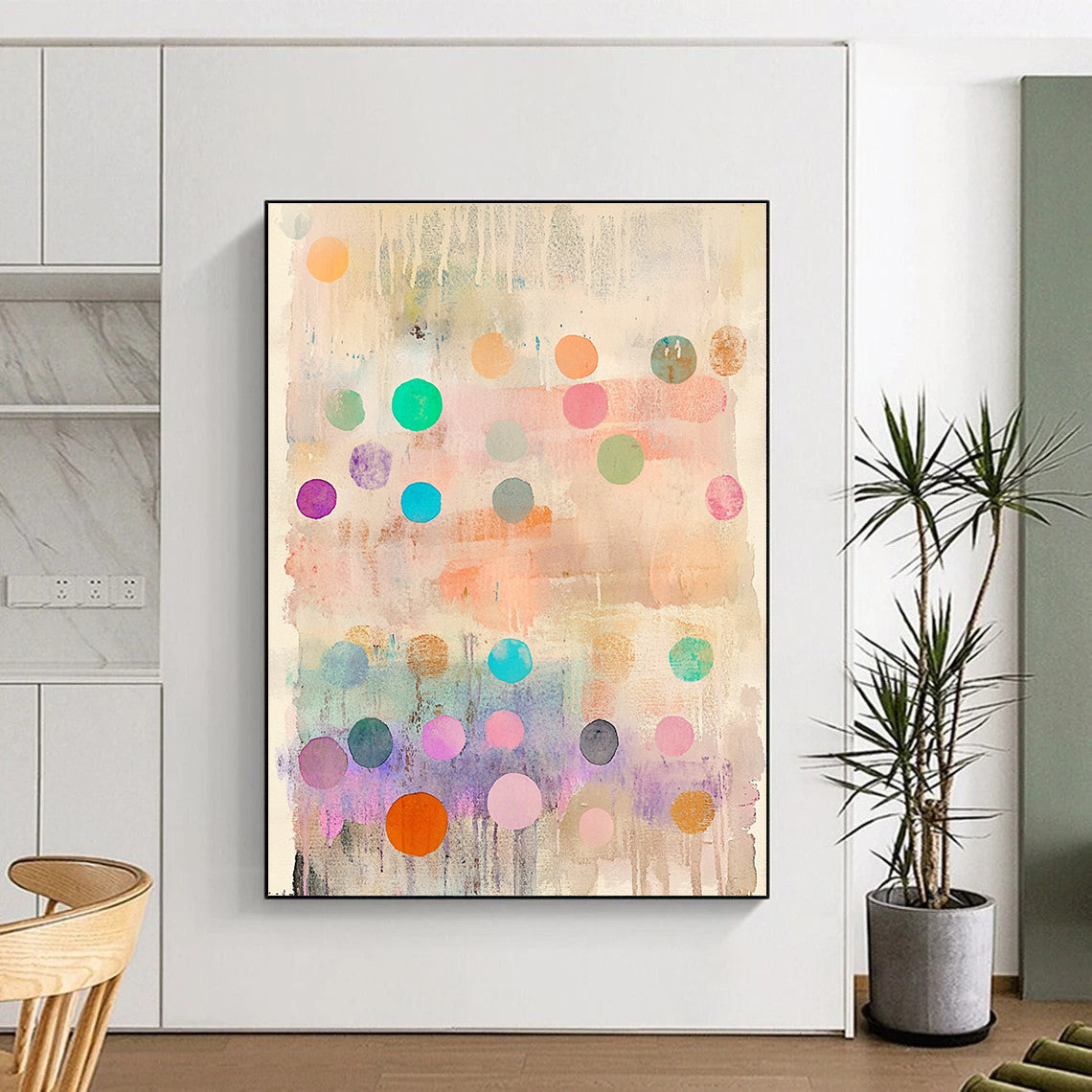 Large abstract painting featuring delicate pastel colors with whimsical round shapes and vibrant polka dot stripes creating an organic depth and dreamy quality.STSC1043