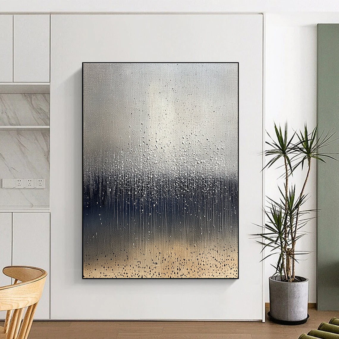 Large abstract painting depicting raindrops on brown soil with a cool gray background and splashing water droplets in dark blue and white tones.STSC1399