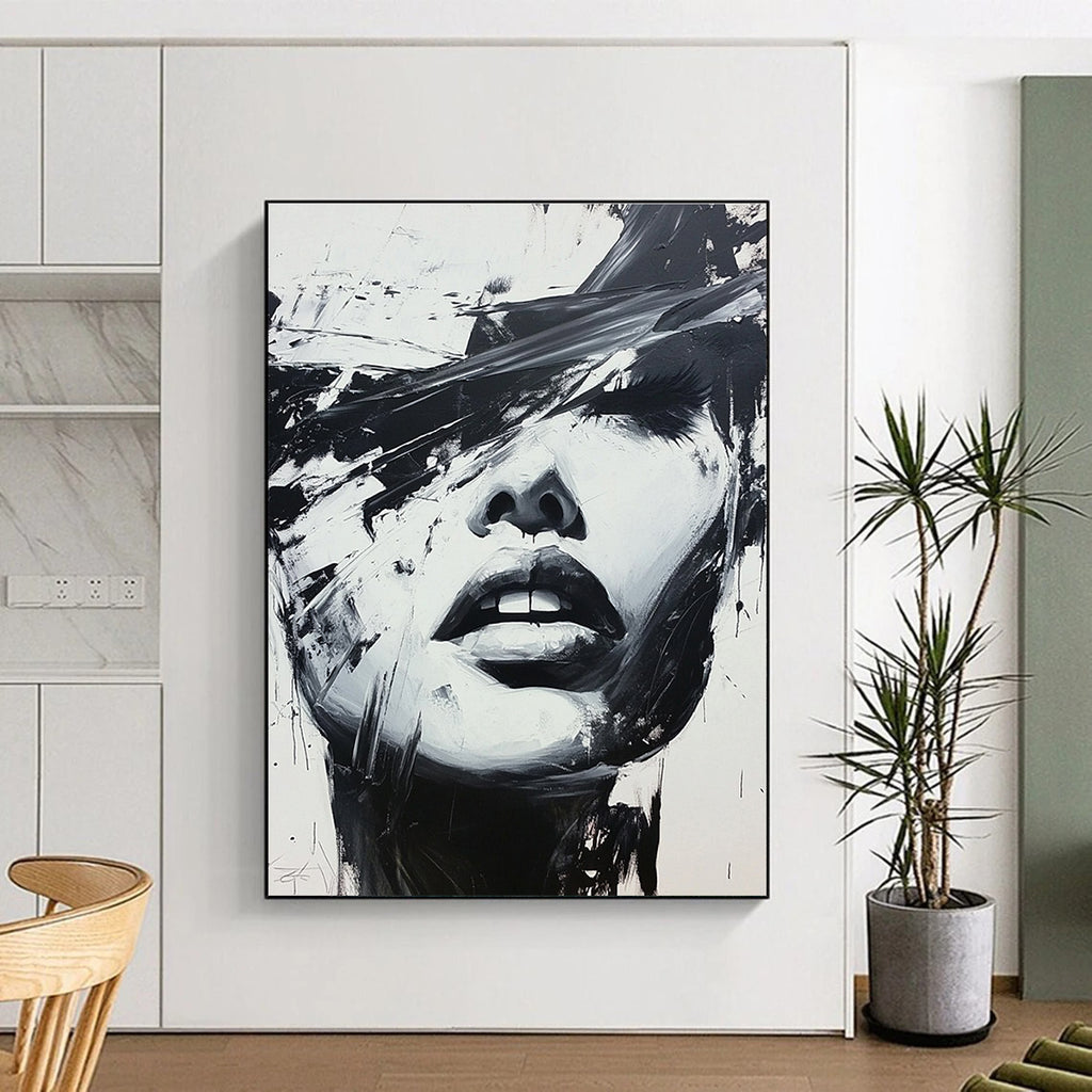 Large abstract black and white painting of a woman's face featuring expressive oil paint splatters in a dynamic graffiti style.STSC023