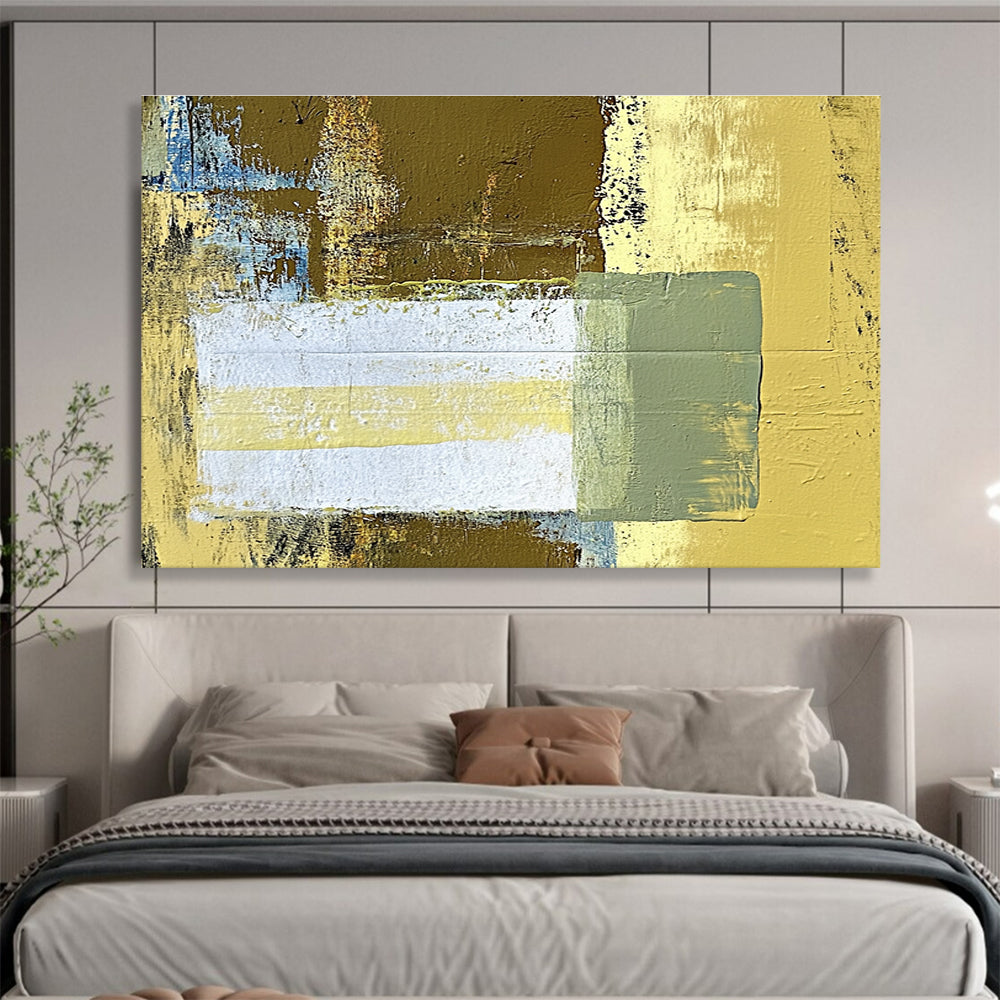 Large abstract painting featuring beige and yellow tones with a central white rectangle and green stripe against a dark brown background.SC425