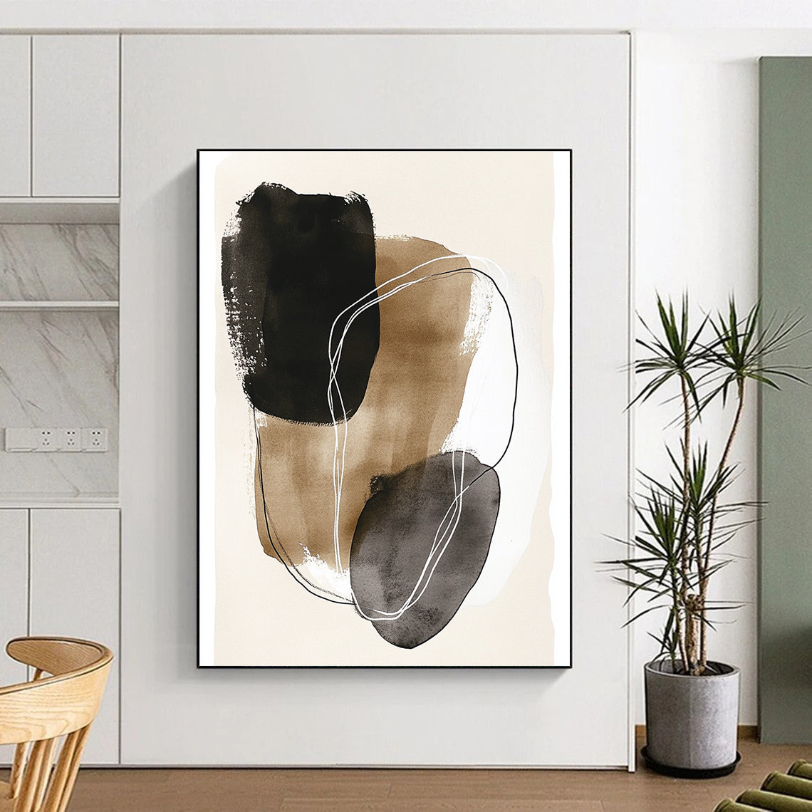 Large abstract art featuring minimal line art with dark gray and beige shapes outlined in white on a beige paper background.STSC1459