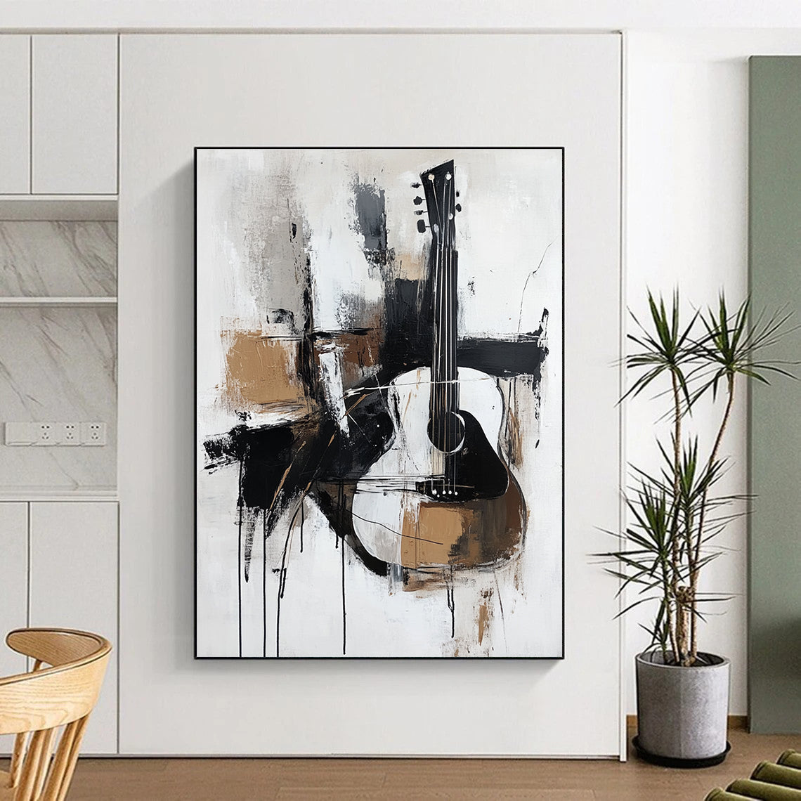 A large abstract painting featuring thick brush strokes in black white grey and brown with a minimalistic abstract guitar in elegant neutral tones.STSC818
