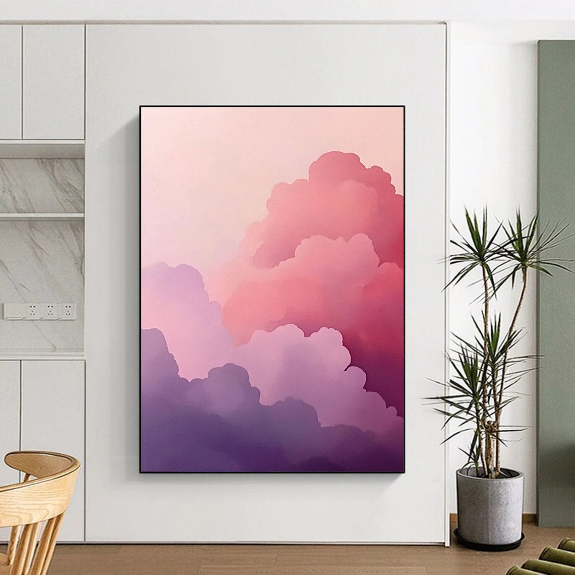A large abstract painting featuring pink clouds in a minimalist style with soft purple and gray hues creating a dreamy atmosphere.STSC1160