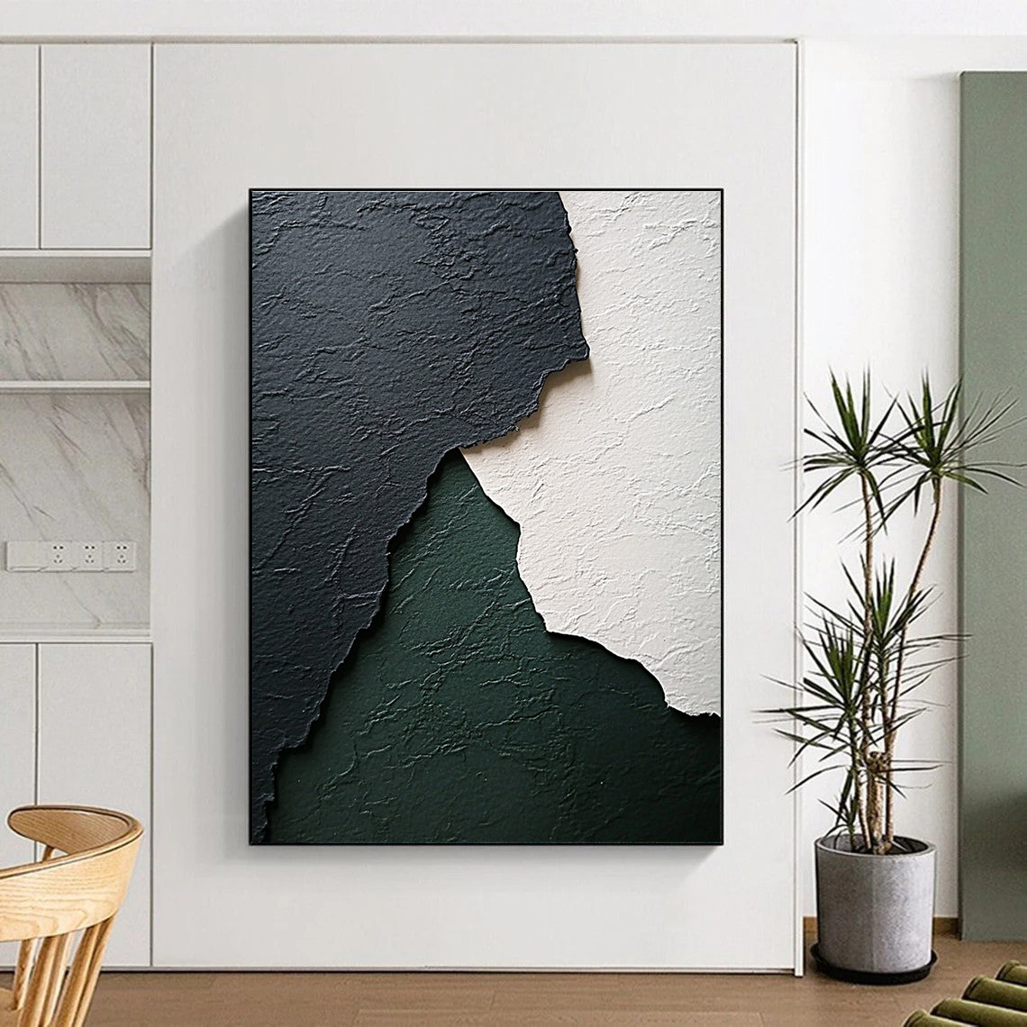 Abstract art featuring textured black white and green paper with subtle gray and emerald tones and a wave-like shape enhancing its worn appearance.STSC1281