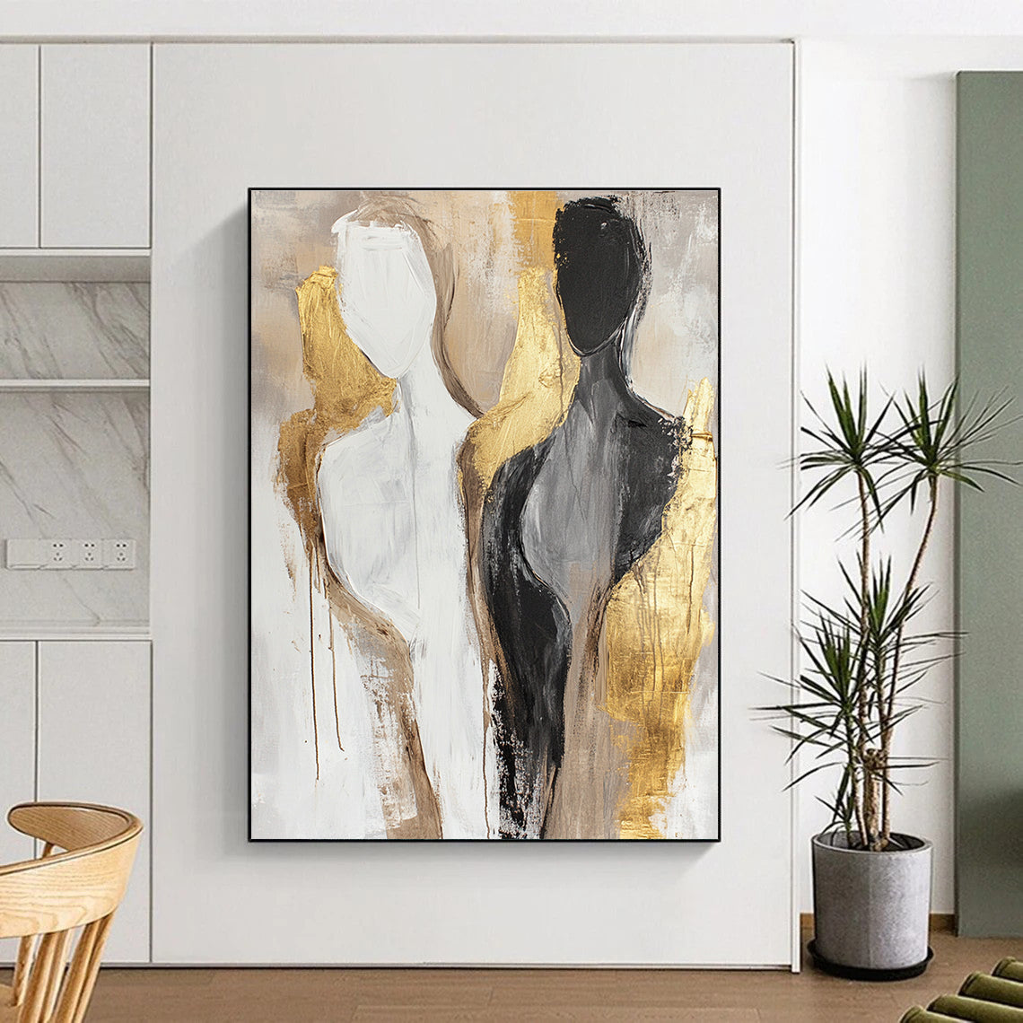 Large abstract painting featuring neutral tones and gold accents with female bodies in a minimalistic design and soft brush strokes.STSC441