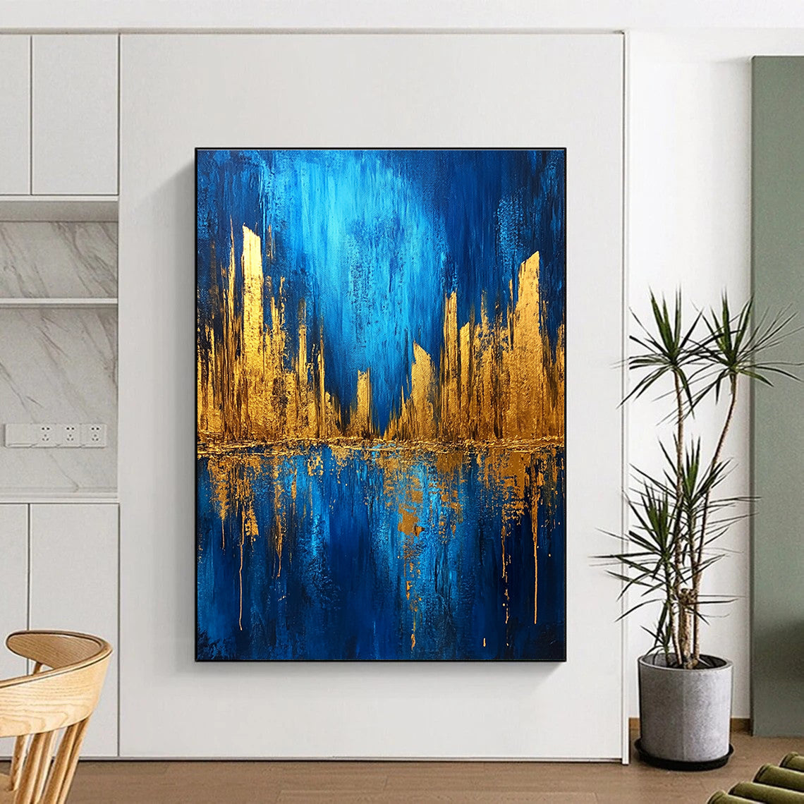 Large abstract painting featuring a metallic gold and blue cityscape on a dark textured background with bold brush strokes.STSC578