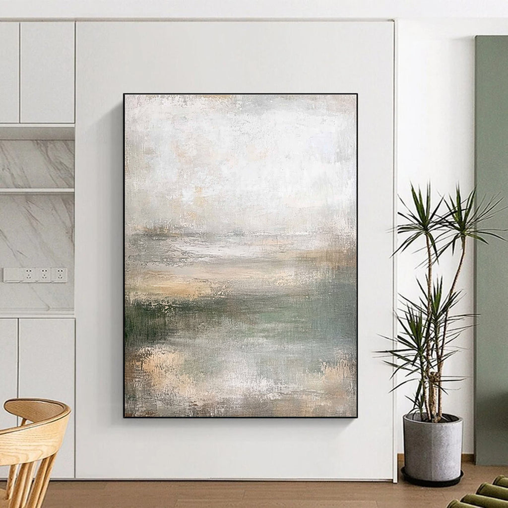 Large abstract painting in muted greens soft grays and beiges featuring a textured canvas and soft edges in neutral tones.STSC219